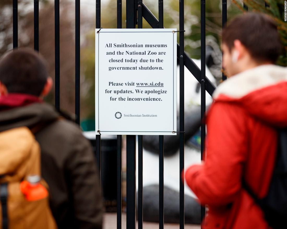 A closed sign is posted on the gate of Smithsonian&#39;s National Zoo on January 2.