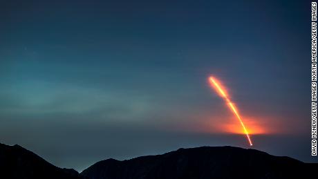 The Atlas 5 rocket carrying the Mars InSight probe launches from Vandenberg Air Force Base, as seen from the San Gabriel Mountains more than 100 miles away, on May 5, 2018.