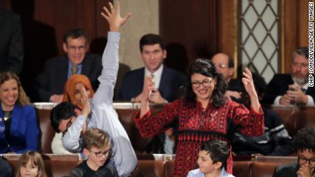 Rep. Rashida Tlaib of Michigan votes for Pelosi as House Speaker as one of her children "dabs."