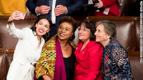 From left to right, Democratic US Reps. Alexandria Ocasio-Cortez, Barbara Lee, Annie Kuster and Jan Schakowsky take a selfie on the House floor.