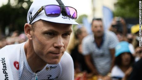 Great Britain&#39;s Christopher Froome cycles past spectators during the signing in ceremony prior to the 15th stage of the 105th edition of the Tour de France cycling race, between Millau and Carcassonne on July 22, 2018. (Photo by Philippe LOPEZ / AFP)        (Photo credit should read PHILIPPE LOPEZ/AFP/Getty Images)