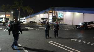 Torrance police officers investigate a shooting at the Gable House Bowl in Torrance on Saturday, Jan. 5, 2019. Early reports are that three people have been killed and four others injured in the shooting that followed a fight at the bowling alley. 