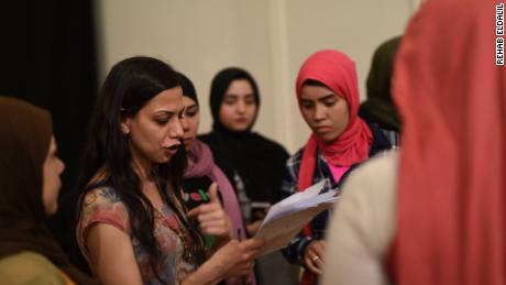 Preparations for one of the Bussy shows, where women tell stories of sexual harassment and other forms of violence. 