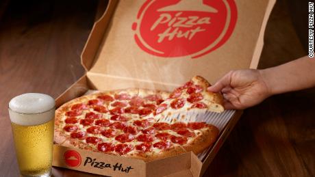 Pizza Hut hopes to expand beer delivery to 1,000 locations by the summer. 