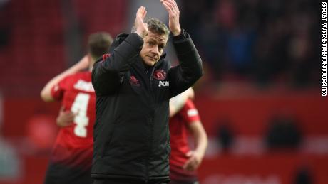 Manchester United's Norwegian caretaker manager Ole Gunnar Solskjaer gestures to the crowd at the end of his team's match against Reading at Old Trafford.