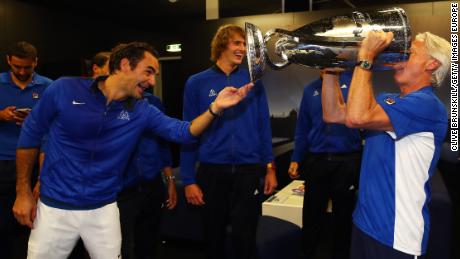 Bjorn Borg, (far right), Roger Federer (left) and Alexander Zverev celebrate winning the Laver Cup. 