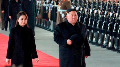 In this Monday, Jan. 7, 2019, photo provided on Tuesday, Jan. 8, 2019 by the North Korean government, North Korean leader Kim Jong Un walks with his wife Ri Sol Ju at Pyongyang Station in Pyongyang, North Korea, before leaving for China. Kim left for China for a four-day trip, the North's state media reported Tuesday, amid speculation that he may attempt to coordinate his positions with Beijing ahead of his likely summit with U.S. President Donald Trump. Independent journalists were not given access to cover the event depicted in this image distributed by the North Korean government. The content of this image is as provided and cannot be independently verified. Korean language watermark on image as provided by source reads: &quot;KCNA&quot; which is the abbreviation for Korean Central News Agency. (Korean Central News Agency/Korea News Service via AP)