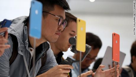 Visitors inspecting the new iPhone XR at an Apple special event in Cupertino in September.