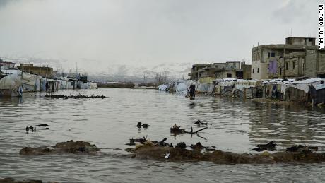 Plains, now submerged in water, separate two Syrian refugee camps in the Bar Elias area. 