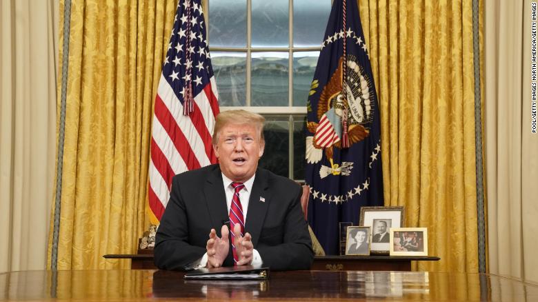 WASHINGTON, DC - JANUARY 08: U.S. President Donald Trump speaks to the nation in his first-prime address from the Oval Office of the White House on January 8, 2019 in Washington, DC. A partial shutdown of the federal government has gone on for 17 days following the president's demand for $5.7 billion for a border wall while Democrats have refused.  (Photo by Carlos Barria-Pool/Getty Images)