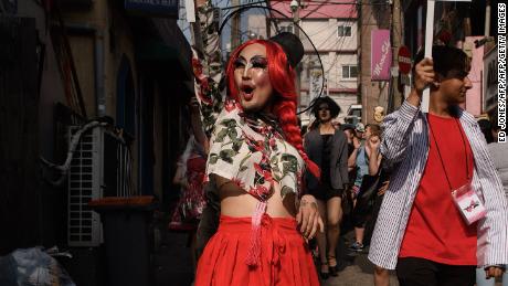 In a photo taken on May 26, 2018 participants of the &#39;Seoul Drag Parade&#39; march in the Itaewon district of Seoul. - South Korea held its first ever drag parade this weekend, a small but significant step for rights activists in a country that remains deeply conservative when it comes to gender and sexuality. (Photo by Ed JONES / AFP)        (Photo credit should read ED JONES/AFP/Getty Images)