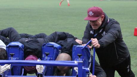 Milton Haig oversees Georgia's scrum practice.