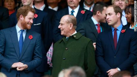 LONDON, ENGLAND - OCTOBER 31:  Prince Harry, Prince Phillip and Prince William enjoy the atmosphere during the 2015 Rugby World Cup Final match between New Zealand and Australia at Twickenham Stadium on October 31, 2015 in London, United Kingdom.  (Photo by Phil Walter/Getty Images)
