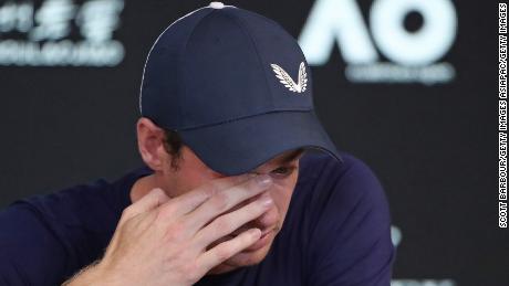 Andy Murray wipes away tears as he announces his retirement from tennis. 