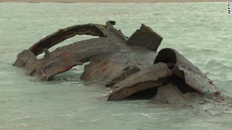 The metal frame of the German U-boat UC 61 is visible during low tide in Wissant, France.