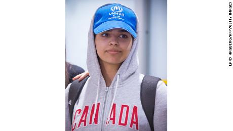 Saudi teenager Rahaf Mohammed al-Qunun arrives at Pearson International airport in Toronto, Ontario, on January 12, 2019. - The young Saudi woman who fled her family seeking asylum abroad is scheduled to land in Canada on Saturday after successfully harnessing the power of Twitter to stave off deportation from Thailand. Rahaf Mohammed al-Qunun, 18, was already en route to Toronto late Friday when Prime Minister Justin Trudeau announced that Canada would take her in. (Photo by Lars Hagberg / AFP)        (Photo credit should read LARS HAGBERG/AFP/Getty Images)