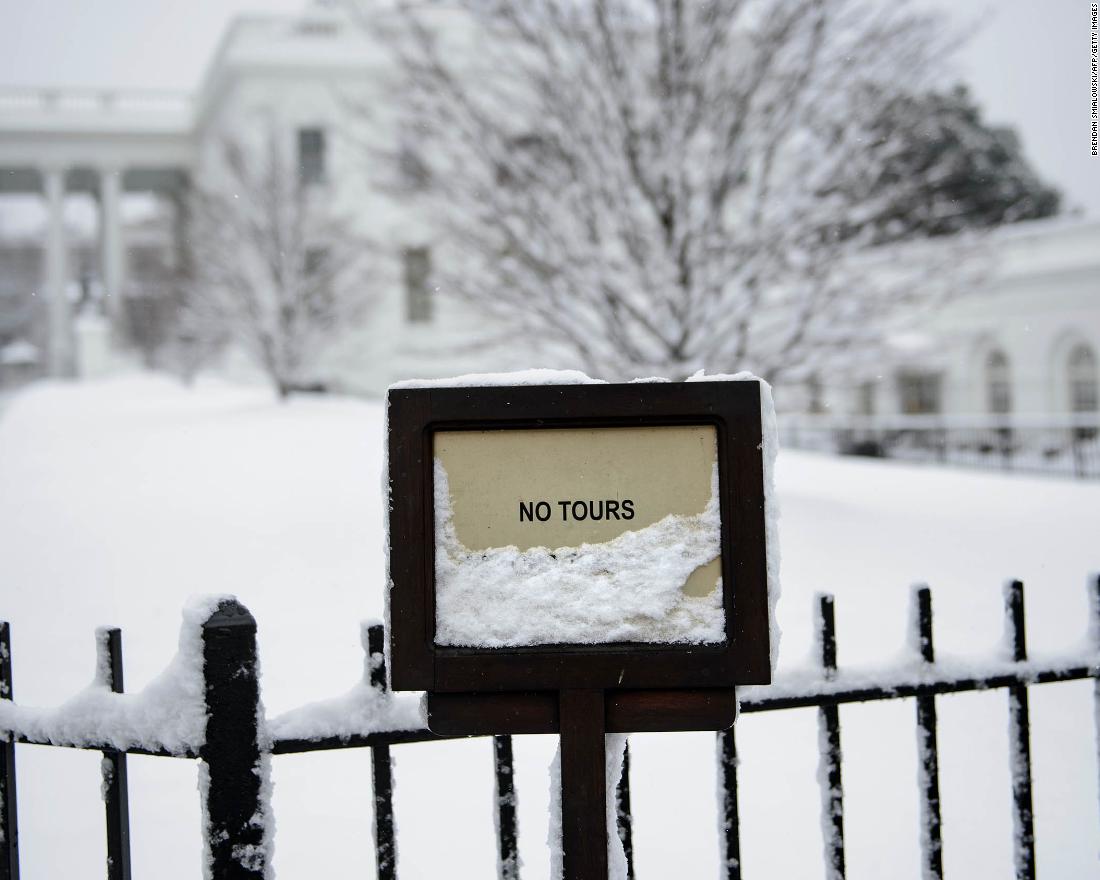 The White House looks especially wintry after a storm on Sunday, January 13.