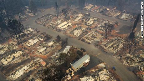 A wary and traumatized Paradise watches the raging inferno from nearby California fires