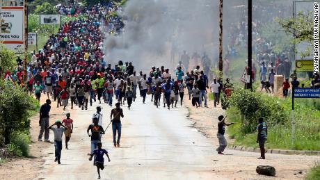 Protesters demonstrate in Harare, Zimbabwe&#39;s capital, on Monday.