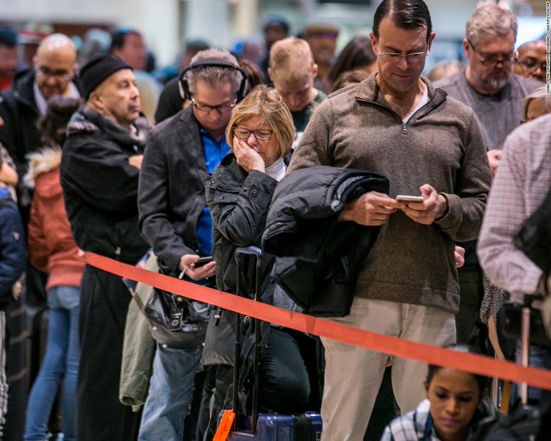 Security lines at Atlanta&#39;s Hartsfield-Jackson International Airport back up Monday, January 14, causing some travelers to miss their flights. Officers with the Transportation Security Administration had been working without pay.