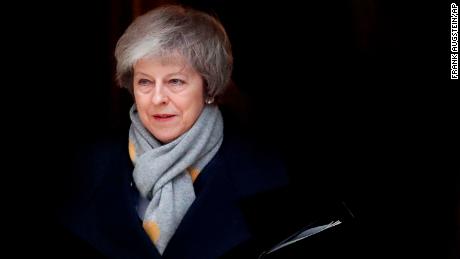 British lawmakers crush Theresa May's Brexit deal by historic margin