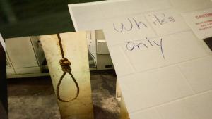 A noose that was found hanging in the plant and graffiti marking the bathroom &quot;White&#39;s Only.&quot;