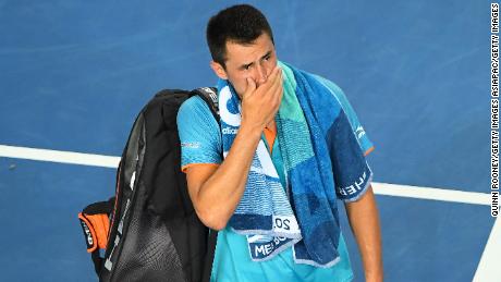 Bernard Tomic lost in the first round of the Australian Open, then took aim at his Davis Cup captain. 