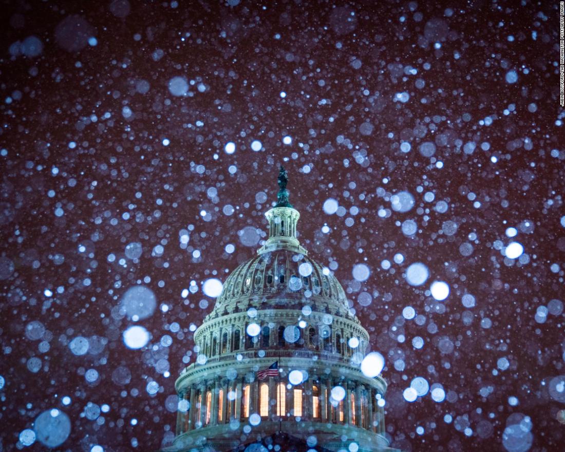 The Capitol amid the snowfall on January 13.