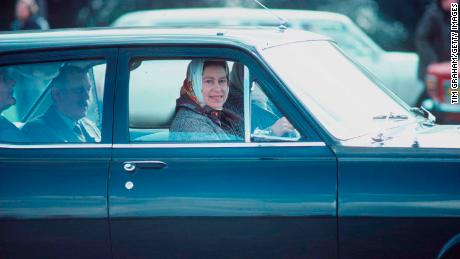 The Queen has driven since she served in the Armed Forces during World War II. Here she is pictured driving a Vauxhall estate car in Windsor Great Park during the 1970s.