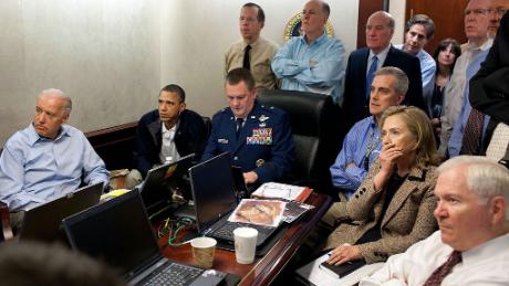 President Barack Obama and Vice President Joe Biden, along with members of the national security team, receive an update on the mission against Osama bin Laden in the Situation Room of the White House, 2011. 