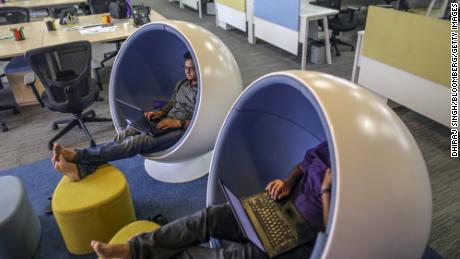 Employees work at Flipkart's headquarters in Bengaluru, India, in 2017.