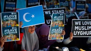 Indonesian Muslims demonstrate to denounce the Chinese goverment's policy on Uyghur Muslims in Banda Aceh, Aceh province on December 21, 2018. (Photo by CHAIDEER MAHYUDDIN / AFP)        (Photo credit should read CHAIDEER MAHYUDDIN/AFP/Getty Images)