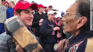 A new video shows a different side of the encounter between a Native American elder and teens in MAGA hats