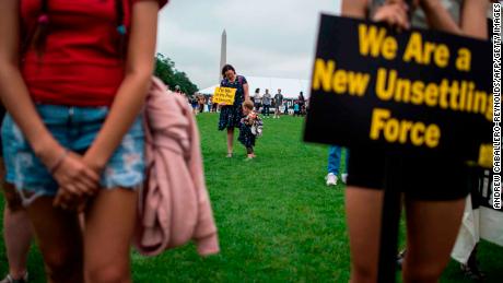 Protesters at a rally in Washington are pictured with the Washington Monument in the background on June 23, 2018.