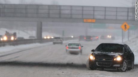 Canceled flights, delayed trains and icy roads as winter storm moves east