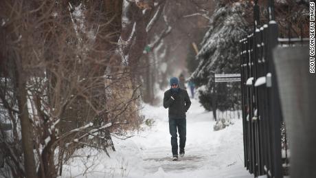 Residents of Chicago dig out after a snowstorm passed through the area on January 19, 2019.