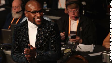 Mayweather attends the WBA welterweight championship between Pacquiao and Broner at MGM Grand 