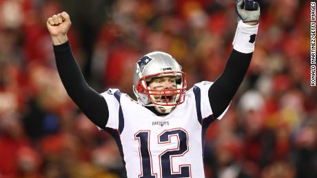 KANSAS CITY, MISSOURI - JANUARY 20: Tom Brady #12 of the New England Patriots celebrates after defeating the Kansas City Chiefs in overtime during the AFC Championship Game at Arrowhead Stadium on January 20, 2019 in Kansas City, Missouri. The Patriots defeated the Chiefs 37-31. (Photo by Ronald Martinez/Getty Images)