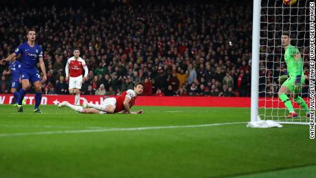 Laurent Koscielny scores Aresenal's second goal against Chelsea.