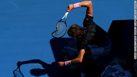 Alexander Zverev smashes his racket in a loss to Milos Raonic at the Australian Open. 