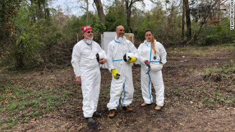 Bill Blair (left) stands with other Team Rubicon volunteers.