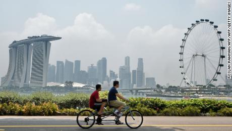 The buildings of foreign multinationals loom high on Singapore's skyline.