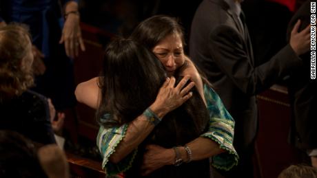 Rep. Haaland embraces fellow Native American Rep. Sharice Davids of Kansas after the swearing in of the 116th Congress.