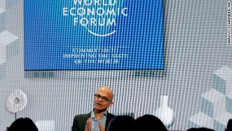 Microsoft&#39;s CEO Satya Nadella addresses the audience of a session at the annual meeting of the the World Economic Forum in Davos, Switzerland, Thursday, Jan. 24, 2019. (AP Photo/Markus Schreiber)