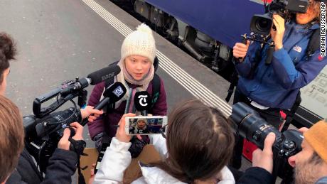 Swedish climate activist Greta Thunberg talks to journalists during her trip to Davos.