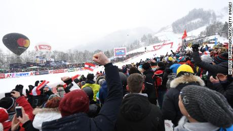 Ski racing fans watch the famous Kitzbuhel downhill.