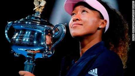 Osaka with the Australian Open trophy. 