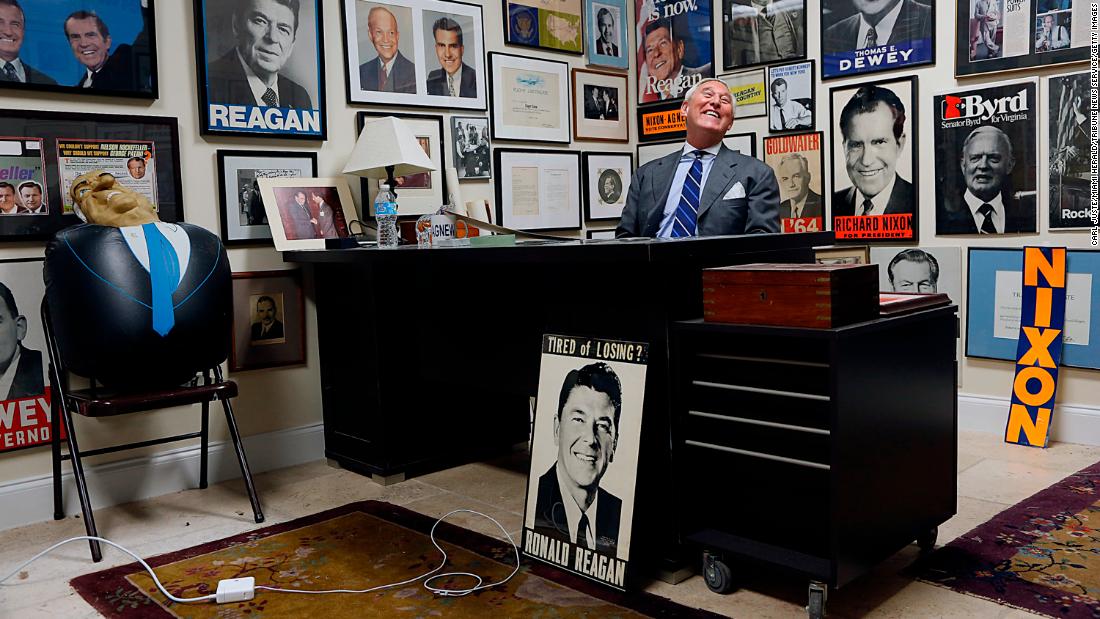 Stone sits at his office desk in Florida.