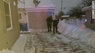 Firefighters called as mom has baby at home. Then they shovel the driveway.