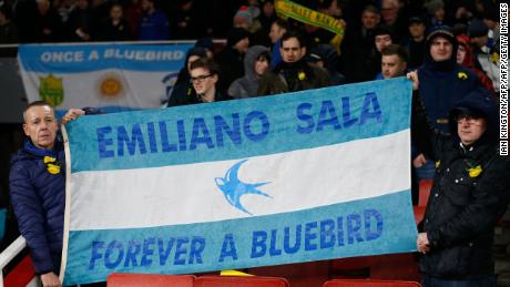 Cardiff fans hold up a banner in the colors of the Argentina flag honoring Emiliano Sala.